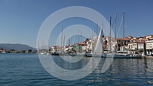 Passage of sailing vessel along the coast of Poros island, Aegean Sea, Greece