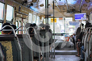 Passage between seats on Thai buses. Traveling in Bangkok by bus.