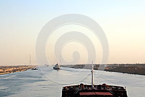 Passage through the Suez Canal by large sea vessels.
