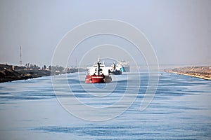 Passage through the Suez Canal by large sea vessels.