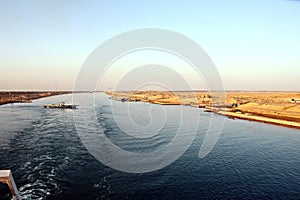 Passage through the Suez Canal by large sea vessels.