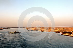 Passage through the Suez Canal by large sea vessels.