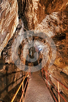 Passage in tourist limestone caves in the Brembana valley Bergamo Italy