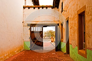 Passageway at Mission San Miguel Arcangel photo