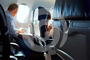 Passanger in aircraft cabin photo