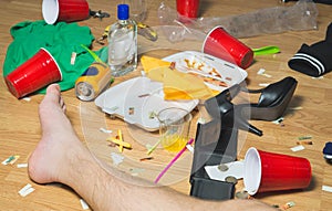 Passed out on messy floor after party