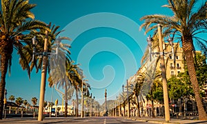 Passeig de Colom street and The Columbus monument or The Colon in Barcelona, Spain.