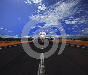 Passenger air plane running on airport runway with beautiful blue sky with white cloud use for transport and traveling journey