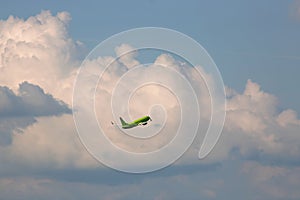 Passenger aircraft flying against cumulus cloud