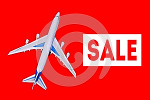 Passenger aircraft on a red background. Sale of air tickets and travel vouchers. Advertising banner and discount. Travel and