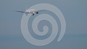 Passenger airliner flies on the sea