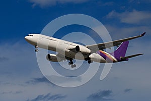 Passenger airliner flight in the blue sky