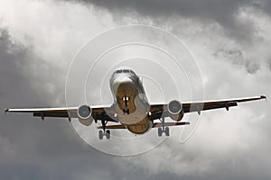 Passenger airliner landing in stormy day