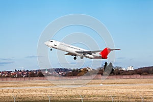 Passenger airliner taking off at an airport