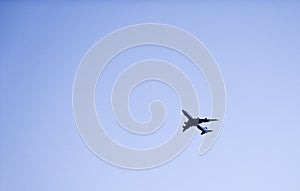 Passenger airplane against clear blue sky, traveler