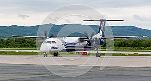 Passenger airplane Bombardier Q400 NextGen of Aurora company just landed