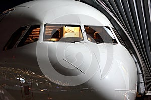 Passenger airplane cockpit in night.