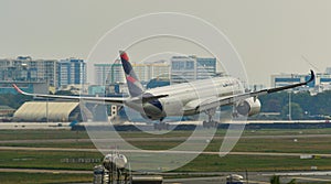 Passenger airplane landing at the airport