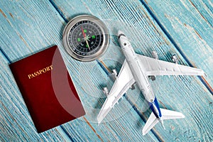 Airplane model with passport and compass