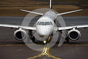 Passenger airplane on a runway, aviation business, commercial flights