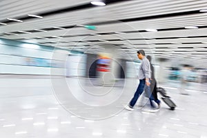 Passenger in the Beijing airport,motion blur