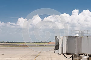 Passenger boarding bridge waiting for a commercial plane to arrive