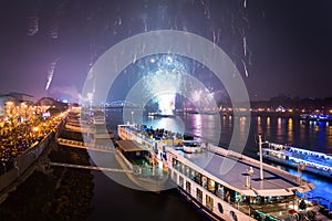 Passenger Boat with Fireworks in Background