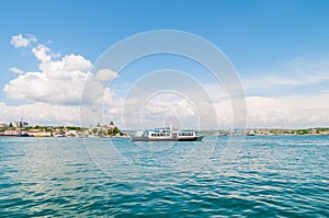 Passenger boat ferry on the sea water in the city