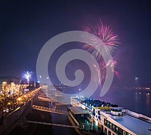 Passenger Boat with Fireworks in Background