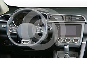 Passenger car dashboard with steering wheel, instrument panel and infotainment display