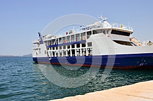 Passenger car ferry  docked in the harbor.