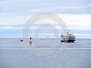 Passenger and Car Ferry In the Ocean Bay