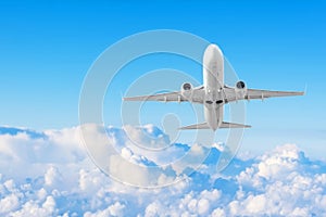 Passenger commercial airliner climbing the echelon above the clouds