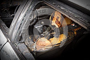 passenger compartment after the fire, partially burned down parts of the car