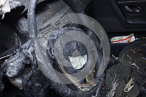 passenger compartment after the fire, partially burned down parts of the car