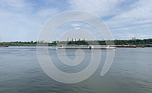 Passenger cruising ship over Danube