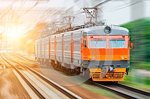 Passenger electric train rides speed railway wagons journey light