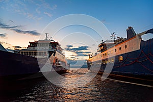 Passenger ferries in the harbour at sunset, the Aegean sea, Thassos island, Greece travelling, transportation photo