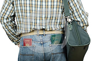 Passenger holding Tonga and Russian passports in rear pockets