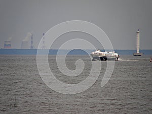 A passenger hydrofoil is moving rapidly through the water. Gulf of Finland, St. Petersburg.
