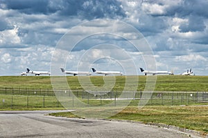 Passenger Jet Aircraft Lined Up Waiting On Takeoff Permission photo