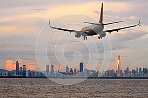 Passenger jet airliner plane arriving or departing Shenzhen, China