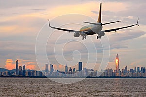 Passenger jet airliner plane arriving or departing Shenzhen, China photo