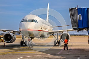 Passenger jet airplane arriving on airport