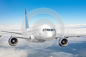 Passenger jet plane in the blue sky. Aircraft flying high through the cumulus clouds. Close up view airplane in flight