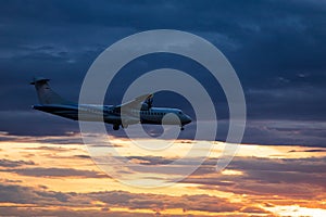 Passenger jet plane in the sky. Airplane flies high above the clouds