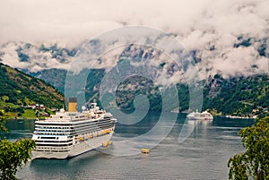 Passenger liner docked in port. Cruise ship in norwegian fjord. Travel destination, tourism. Adventure, discovery