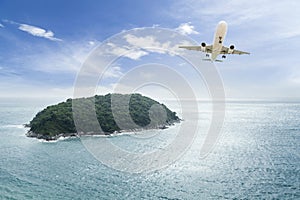 passenger plane flying with beautiful tropical island.