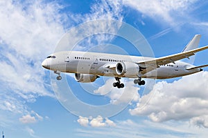 Passenger plane landing at the airport photo