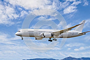 Passenger plane landing at the airport photo